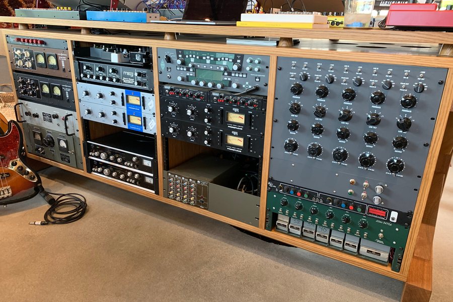 Outboard racks in custom wood cabinetry in Brad Breeck&rsquo;s studio
