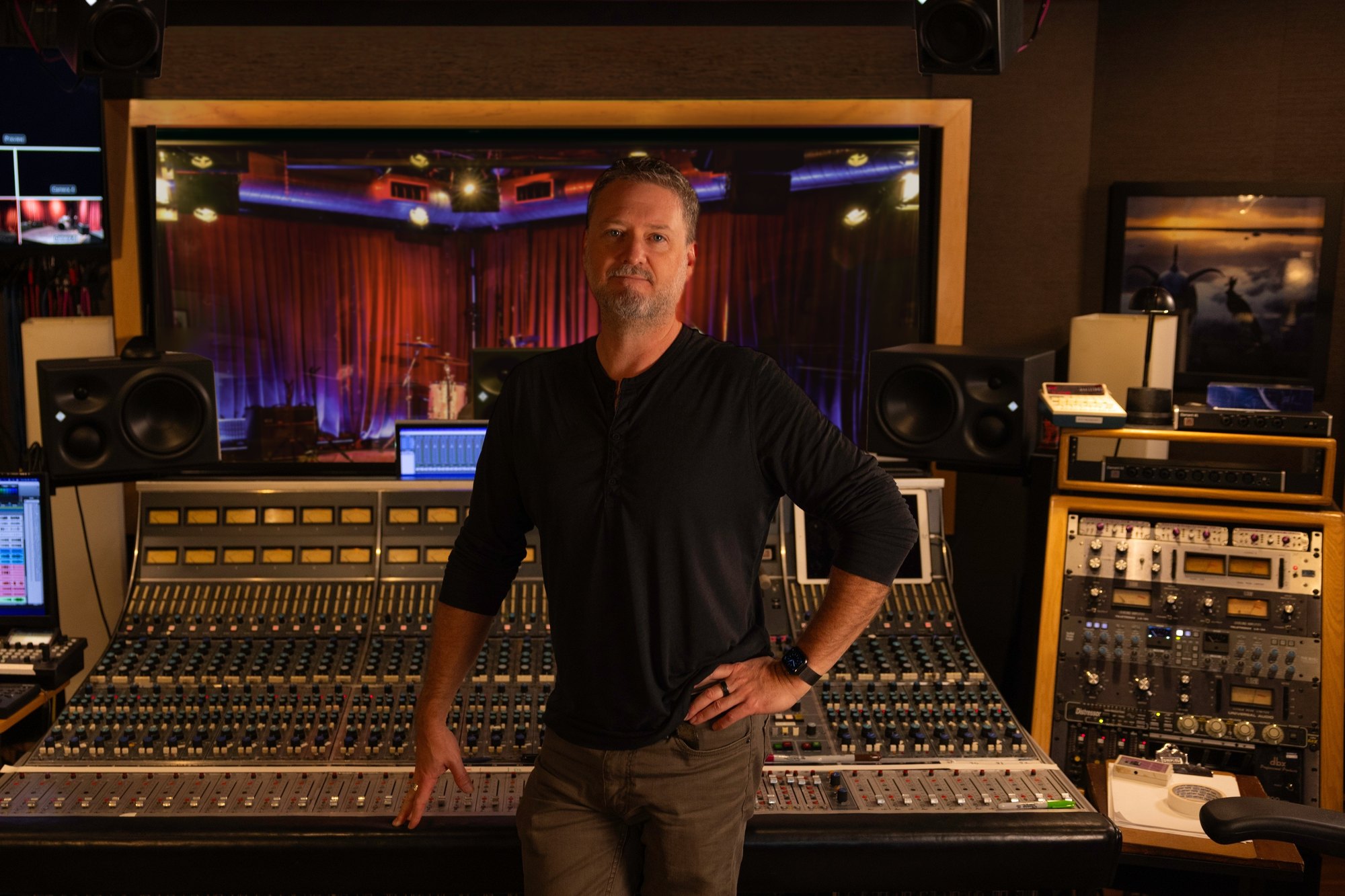 Brandon Duncan at the console in a control room