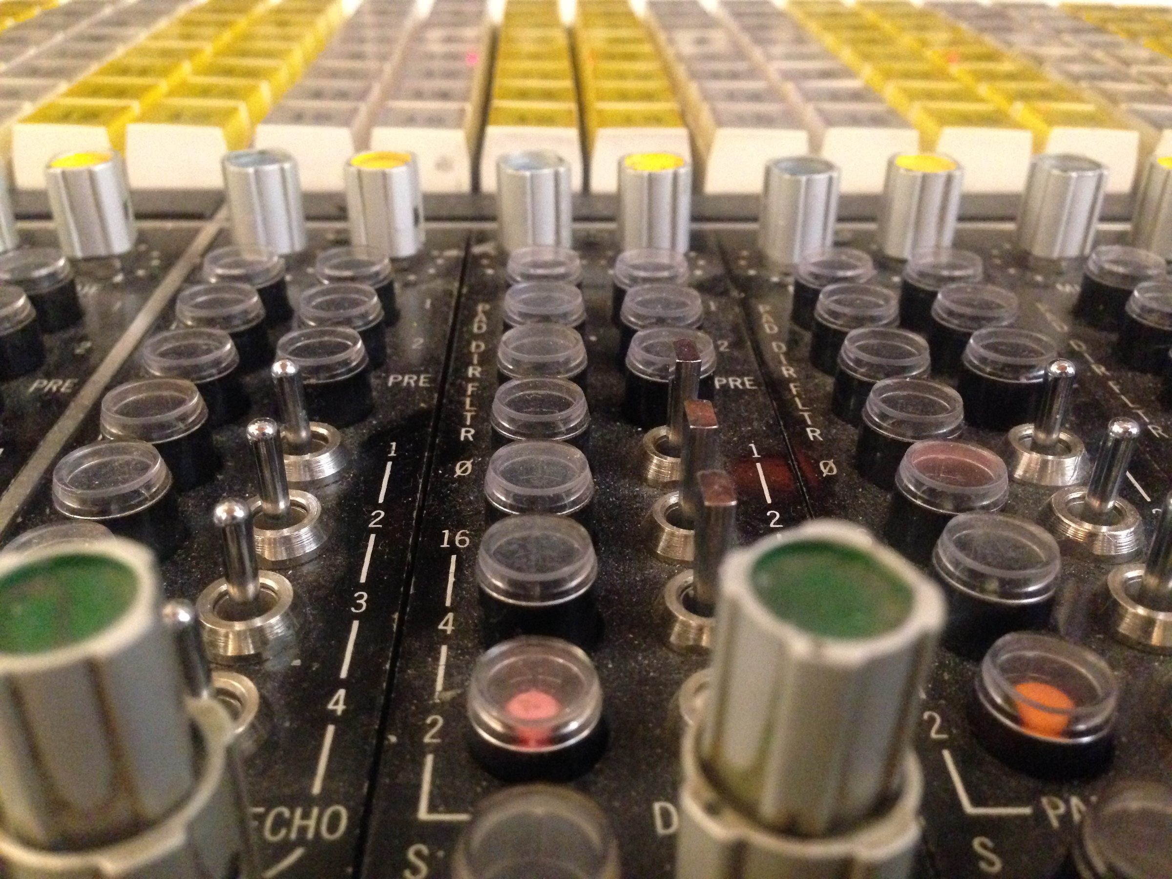 Low view across console knobs and switches