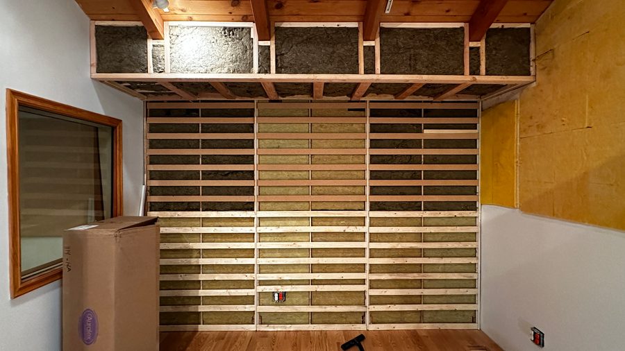 Slatted absorption over insulation